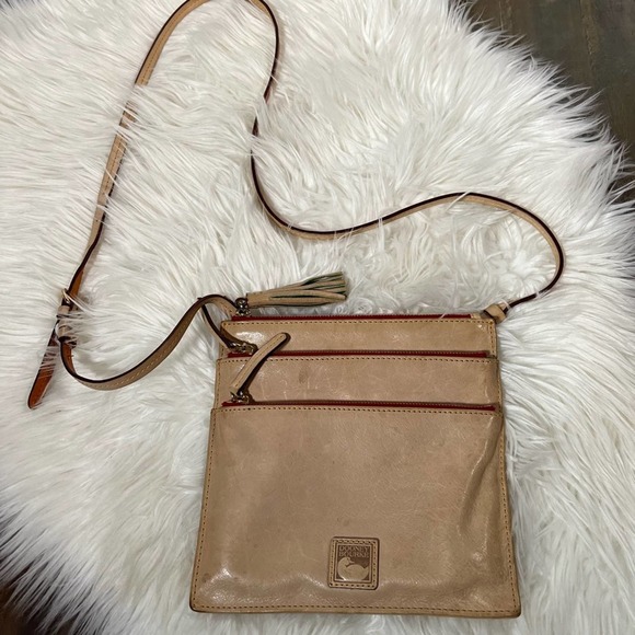 Dooney and Bourke tan Crossbody travel bag - Picture 1 of 6